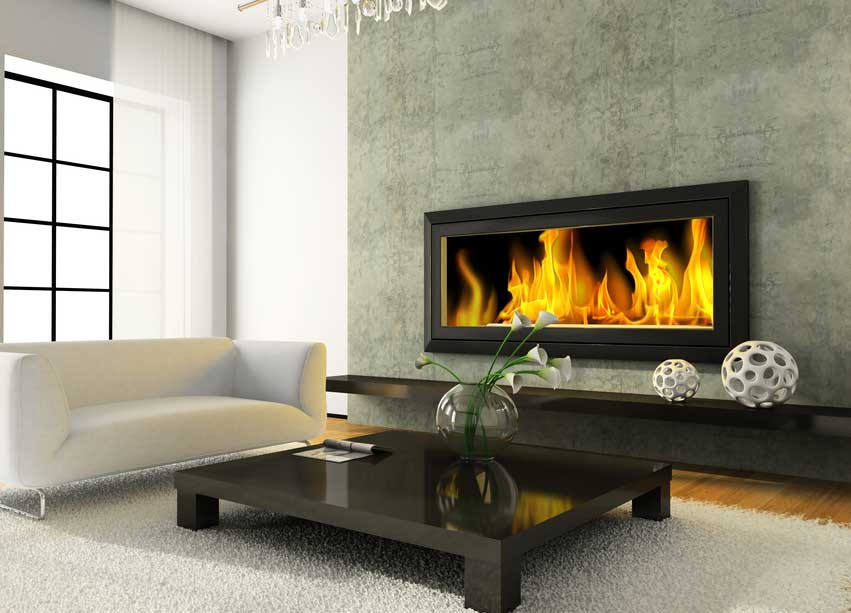 Stock photo of new modern fireplace change-out with white sofa and white lilies on a black coffee table.