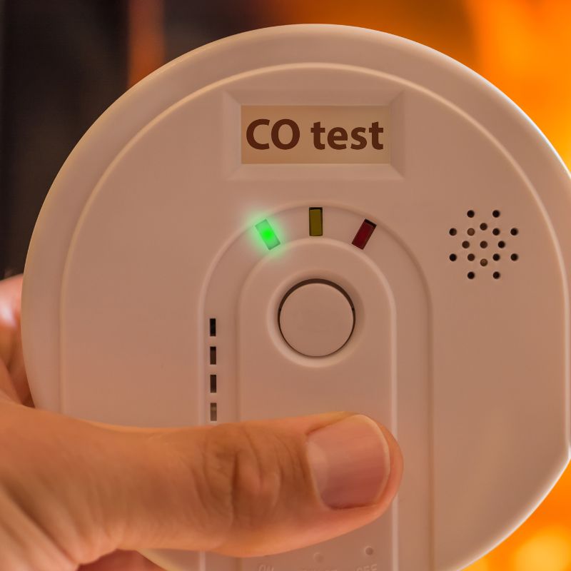 stock photo of CO test detector a round white CO testing machine
